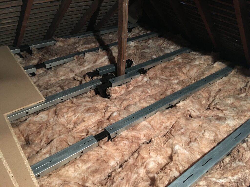 loft boarding being places in an insulated loft
